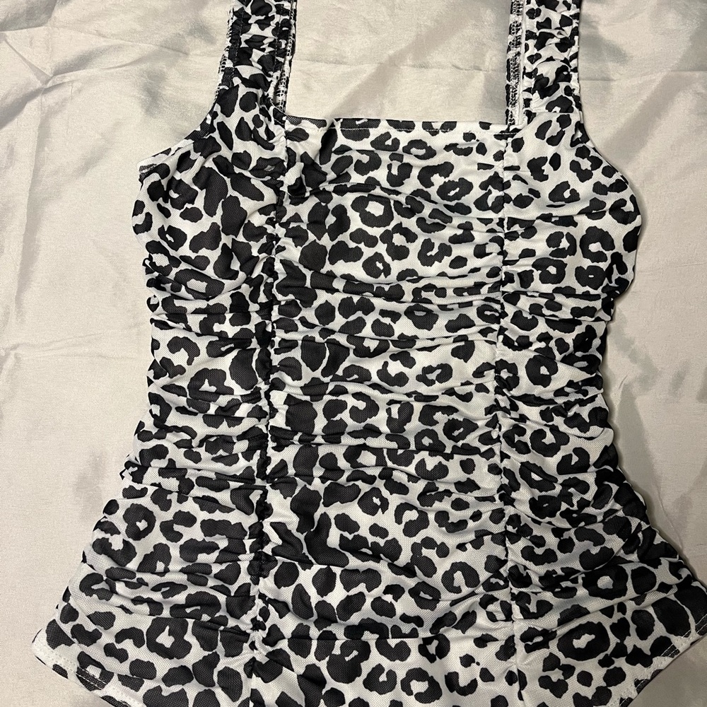 Black and White leopard print mesh bodysuit from Le Lis